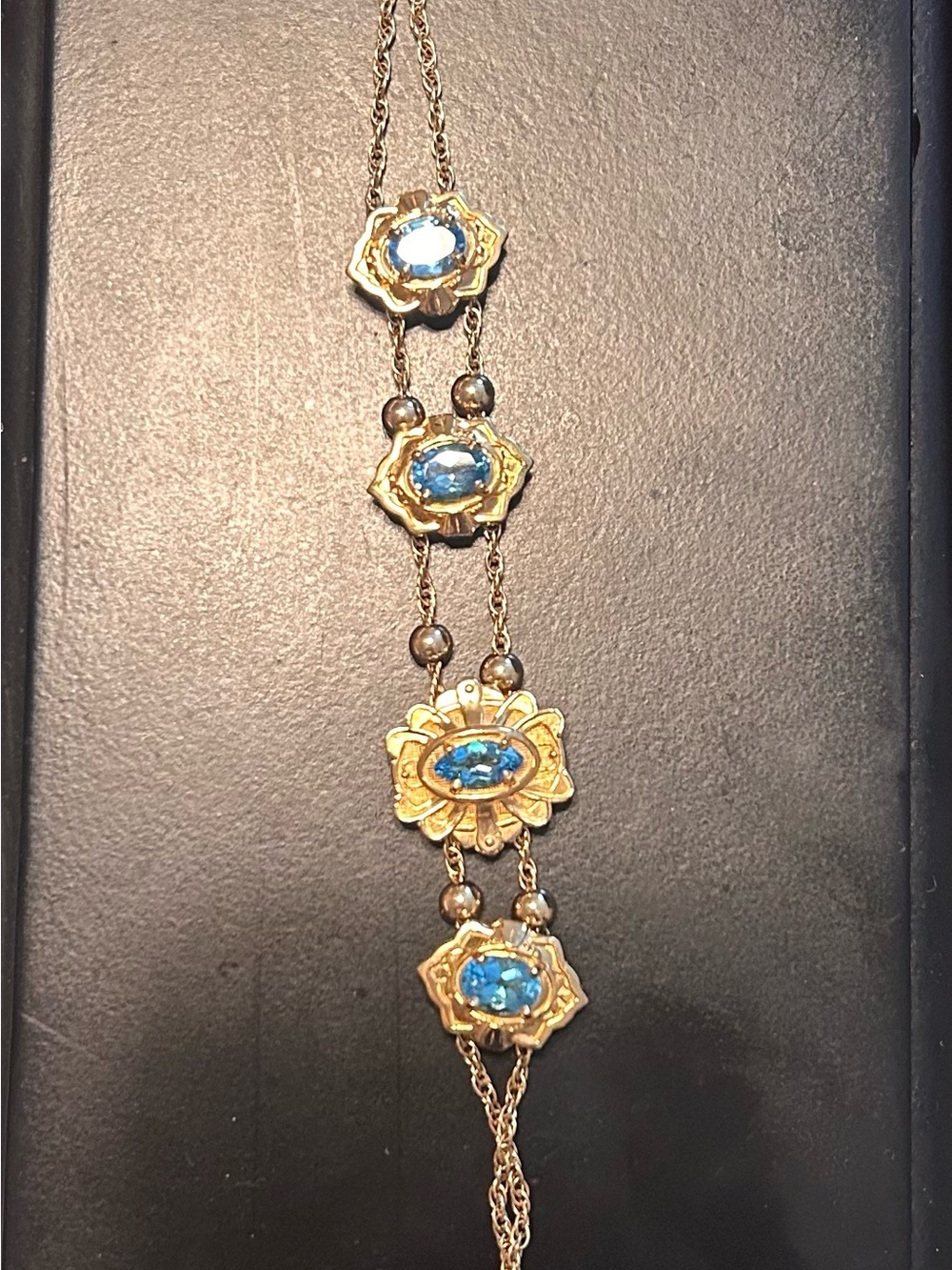 Vintage 14k Gold Floral Bracelet with Blue Gem Accents